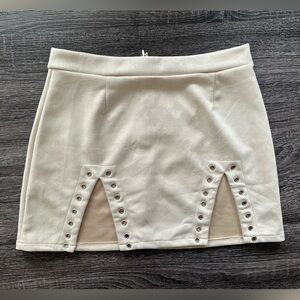 Stylish Cream Mini Skirt with Grommet Accents